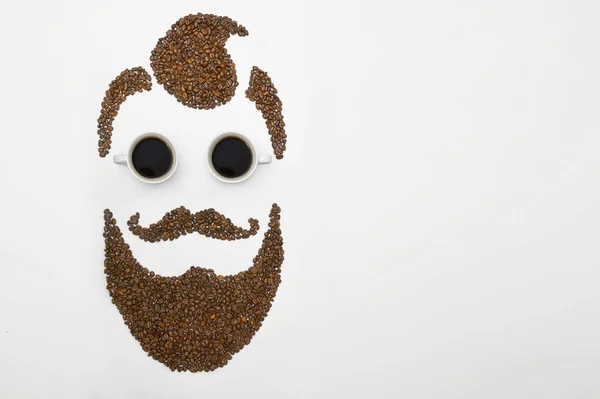 男の顔の形でコーヒー豆 — ストック写真