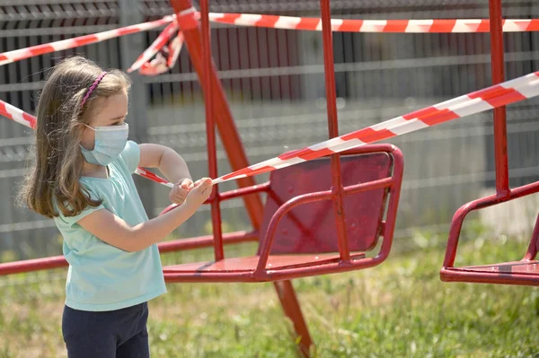 Girl Children Swings Wrapped Signal Tape — Stock Photo, Image