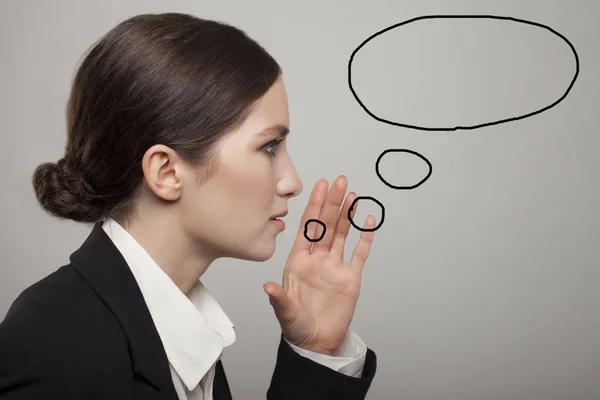 Beautiful young lady thinking about speech or thought bubble — Stock Photo, Image