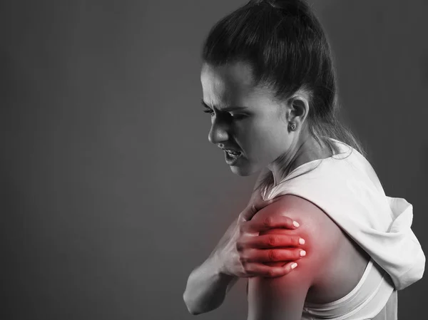 Woman sport pain studio shot back portrait red part bw photo — Stock Photo, Image