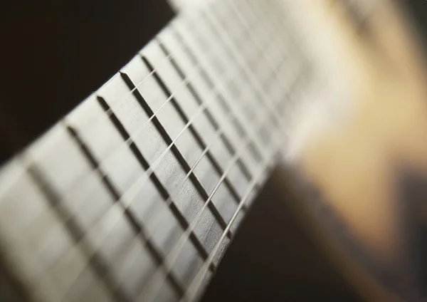 Guitar close up blur effect photo dark — Stock Photo, Image