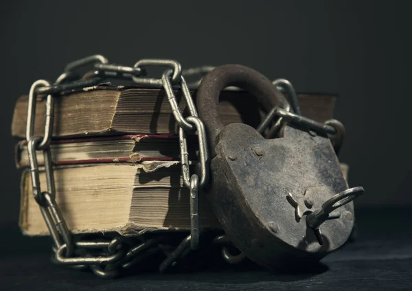 Three old books chain lock concept toning shot — Stock Photo, Image