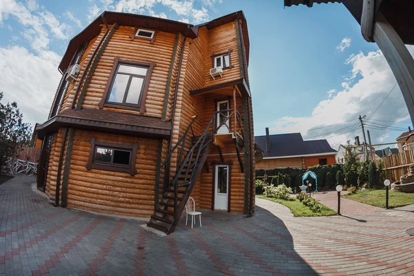 Modern 3-storey wooden cottage — Stock Photo, Image