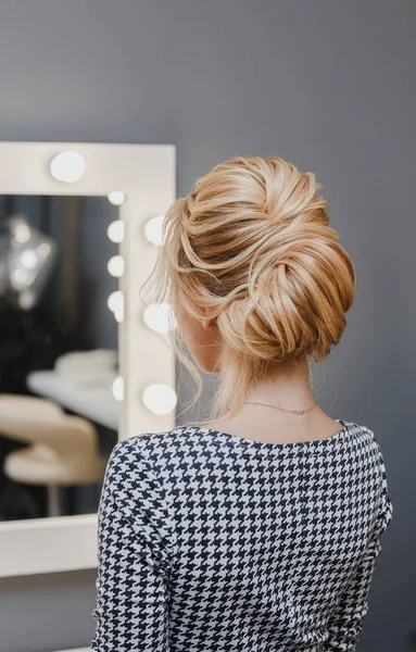 Close up detail of french twist hairstyle, back rear view at hairdresser salon — Stock Photo, Image