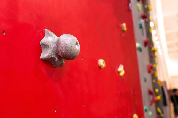 Crochets pierres gros plan sur mur de blocs artificiels — Photo