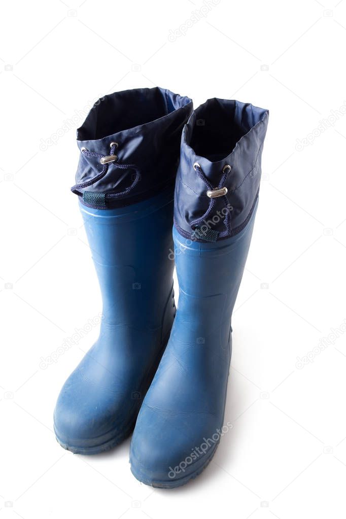 Pair of blue rubber EVA boots isolated on white