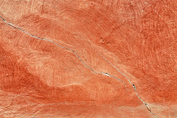 Strukturierten Hintergrund der roten Zementwand mit Riss — Stockfoto