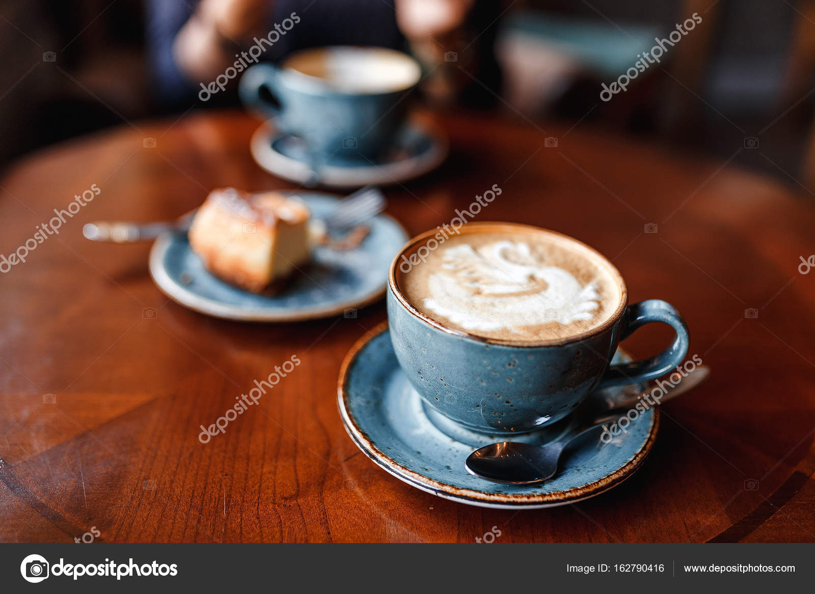 Cake On Cappuccino In Two Table The Cups Cheese Wooden With Brown IYybf7gm6v