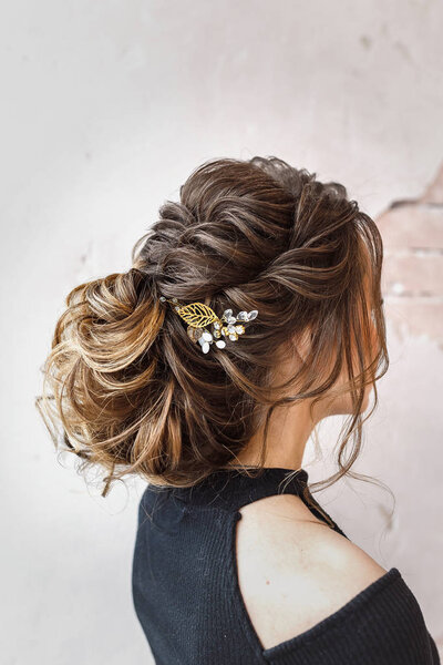 female hairdress for the event, unrecognizable back view