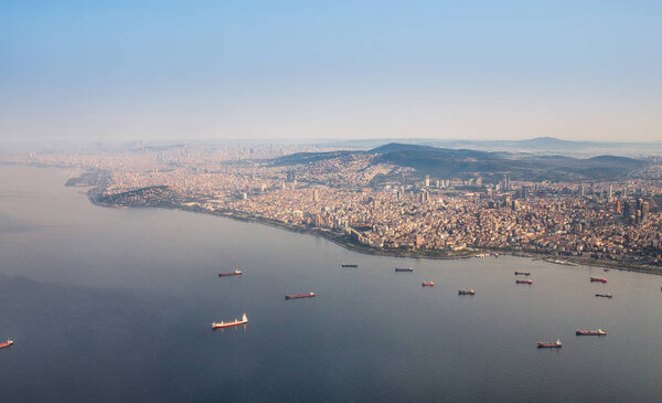 Seascape aerial view from the plane flying on Istanbul Marmara Sea and Golden Horn bay in Turkey