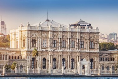 Dolmabahce Palace view from Bosphorus strait in Istanbul Turkey from ferry on a sunny summer day clipart