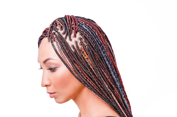 Isolated on white woman with colorful hair braided in thin plaits or dreadlocks in african style — Stock Photo, Image