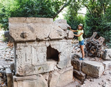 Olympos is an ancient greek town on a mediterranean shore, large historical, archaeological and tourist attraction in Turkey, Chirali clipart