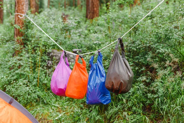 Waterproof dry bags in camping in mountains