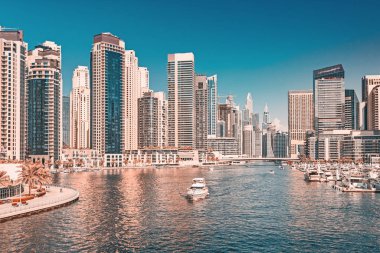 Panoramic views of the Marina district in Dubai with numerous residential skyscrapers hotels. Travel destinations in the UAE