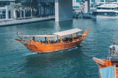 29 November 2019, Dubai, United Arab Emirates: Tourist cruise Abra Dhow traditional wooden boat in Dubai
