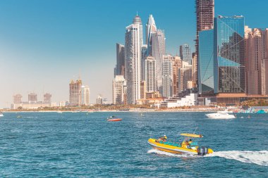 Cityscape view of Dubai skyscrapers - hotels and apartment buildings. Real estate in Persian Gulf concept. Elite resort in United Arab Emirates