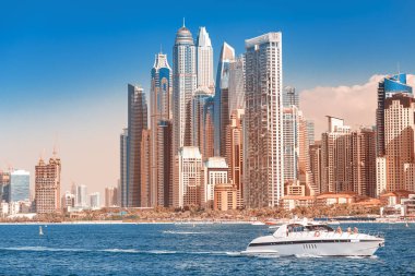 Cityscape view of Dubai skyscrapers - hotels and apartment buildings. Real estate in Persian Gulf concept. Elite resort in United Arab Emirates
