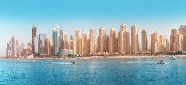 29 November 2019, UAE, Dubai: Numerous skyscrapers residential buildings and apartments and hotels on the Persian Gulf in Dubai. Real estate concept