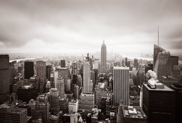 New York skyline. Aerial view over Manhattan with Empire State Building on an overcast day. Sepia toned image. Old photo stylization.