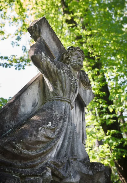 Old statue on grave in Lviv — Stock Photo, Image