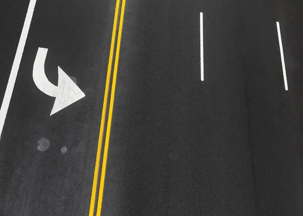 Road markings on asphalt on the street of Manhattan — Stock Photo, Image