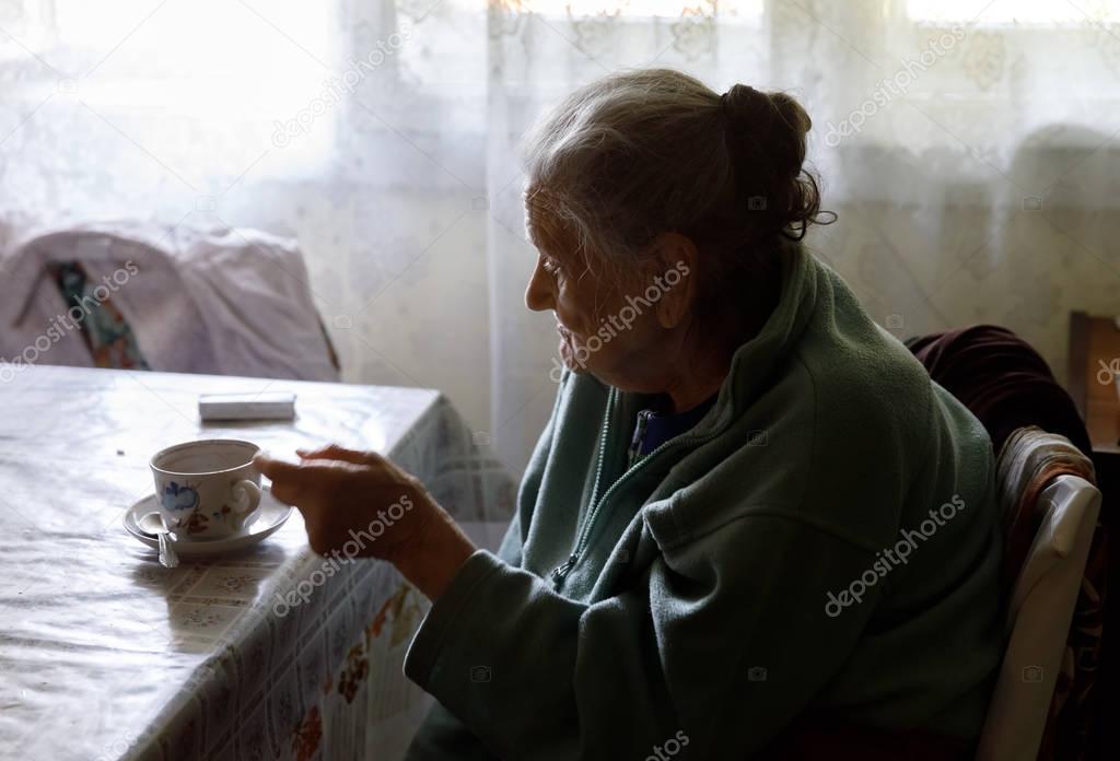 Elderly lonely woman