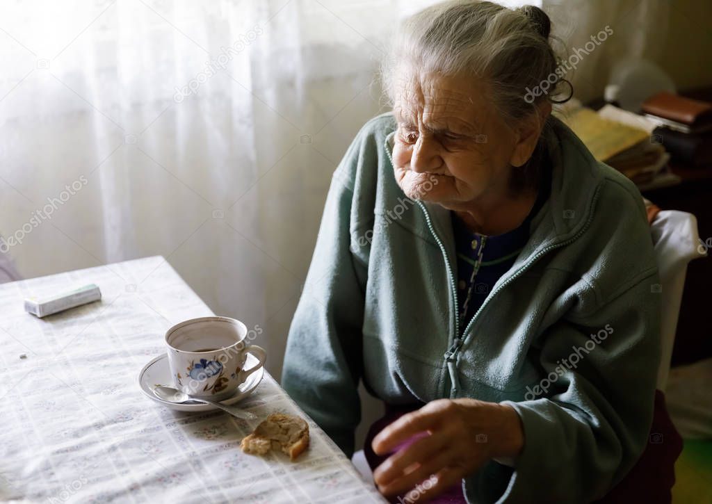 Elderly lonely woman