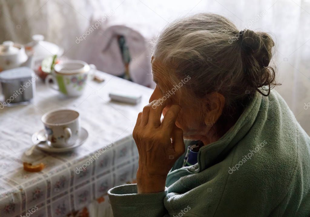 Elderly lonely woman