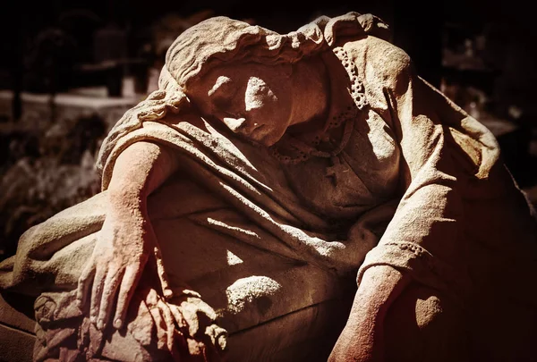 Old statue on grave in Lviv — Stock Photo, Image