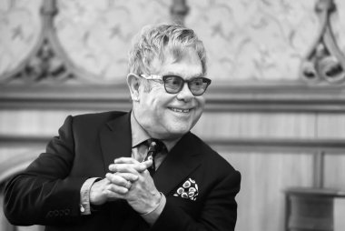 Black and white portrait of Elton John
