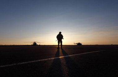 Silhouette of a military man clipart