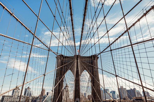 NEW YORK, USA - Sep 22, 2017: Brooklyn Bridge in New York City. Brooklyn Bridge is a hybrid cable-stayed suspension bridge in NYC and is one of the oldest roadway bridges in the United States
