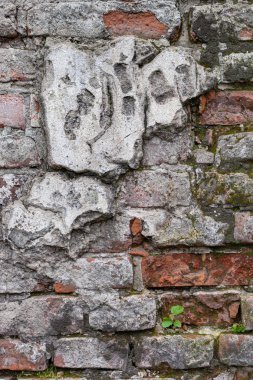 Yaşlı tuğla duvar sıva kırık