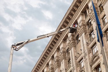 KYIV, UKRAINE - Sep 27, 2019: Street scene in Kyiv, the capital of Ukraine. Repair of an office building on Khreshchatyk
