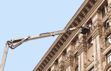 KYIV, UKRAINE - Sep 27, 2019: Street scene in Kyiv, the capital of Ukraine. Repair of an office building on Khreshchatyk