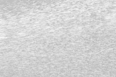 Soyut arkaplan. Parlak su sıçrıyor. Jetler ve çeşme damlaları. Açık gri tonda görüntü.