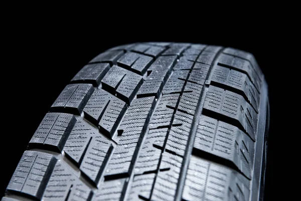 Pneumatique propre. Noir nouveau fond de pneu de voiture brillant . — Photo