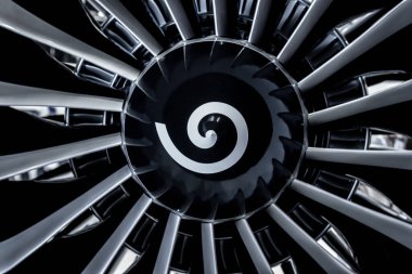Turbine Engine. Modern aviation technologies. Aircraft jet engine detail during maintenance. clipart