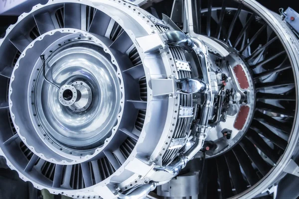 Turbine Engine. Aviation Technologies. Aircraft jet engine detail during maintenance. Blue toned.