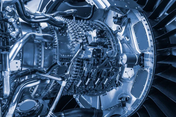 Turbine Engine. Aviation Technologies. Aircraft jet engine detail during maintenance. Blue toned.