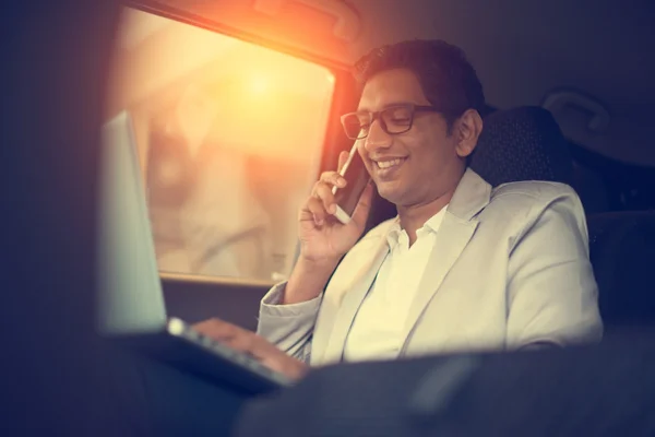 Indian business male using laptop — Stock Photo, Image