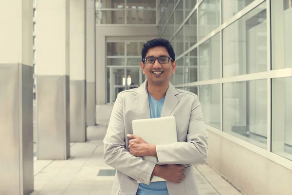 Indian male with laptop — Stock Photo, Image