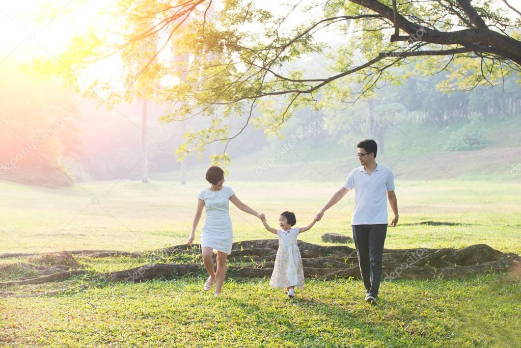 Asian Family in green park