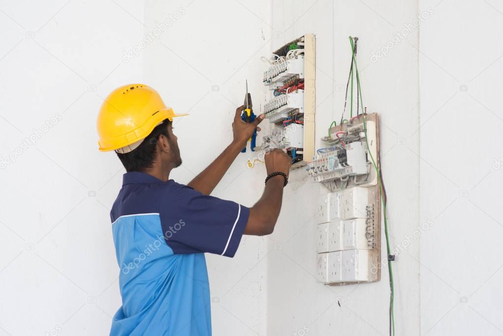  electrician working with switchboard