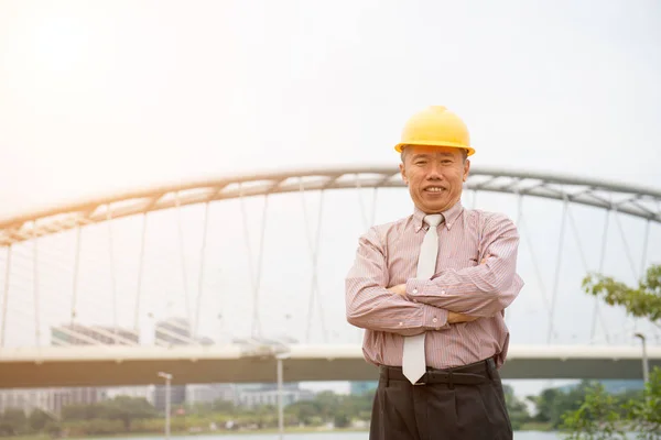 Asian architect in helmet — Stock Photo, Image