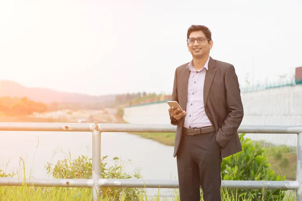 Indian business man with phone — Stock Photo, Image