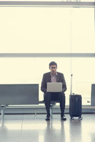 Indian business man using laptop