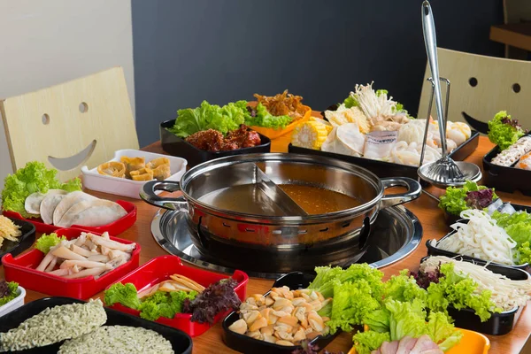 hot pot with Asian food