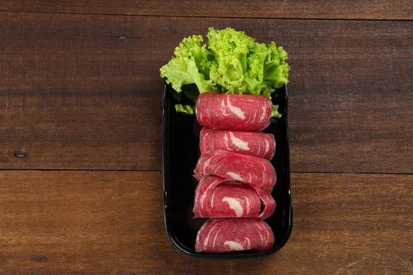 Rolled raw meat — Stock Photo, Image